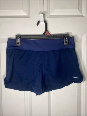 Nike Women’s Navy Blue Athletic Shorts with White Swoosh. Washed but never worn.